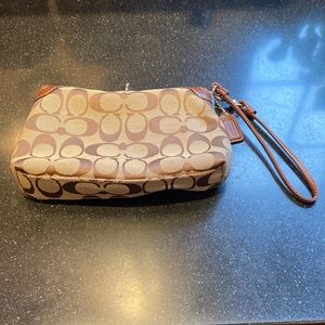 Coach top closure wristlet